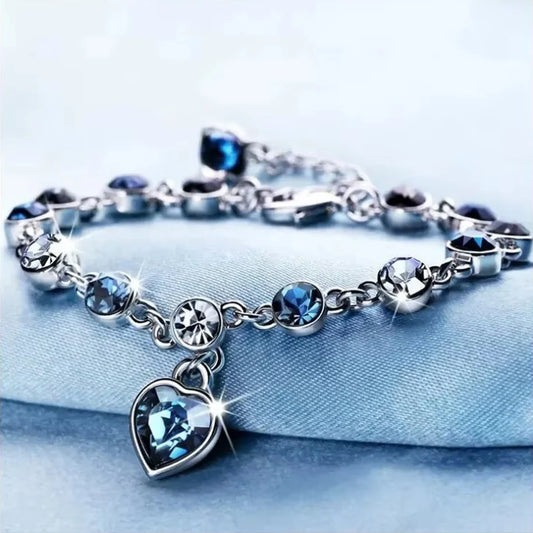 Bracelet porte-bonheur argenté pour femme, en cristal bleu