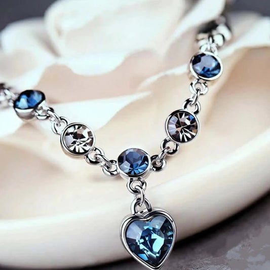 Bracelet porte-bonheur argenté pour femme, en cristal bleu